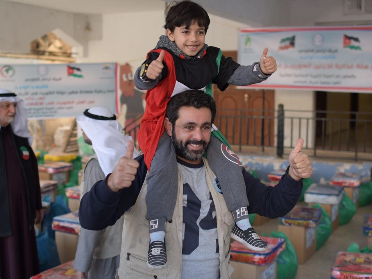  جانب من توزيع دولة الكويت المساعدات الإنسانية على اللاجئين السوريين