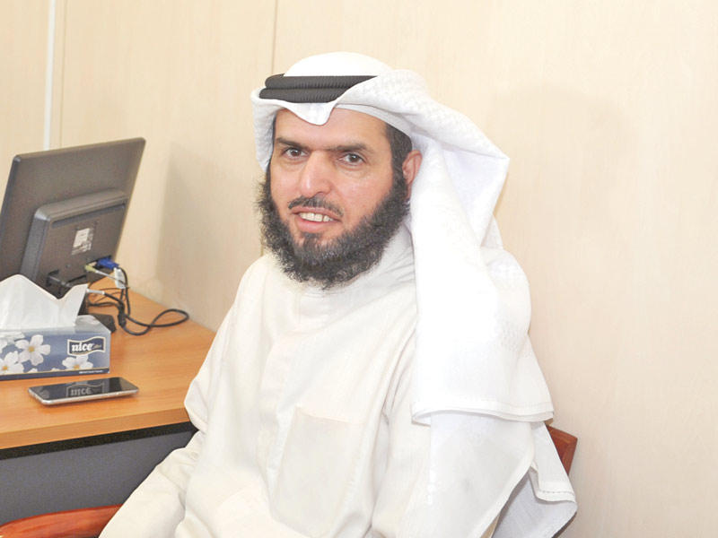 النائب عادل الدمخي