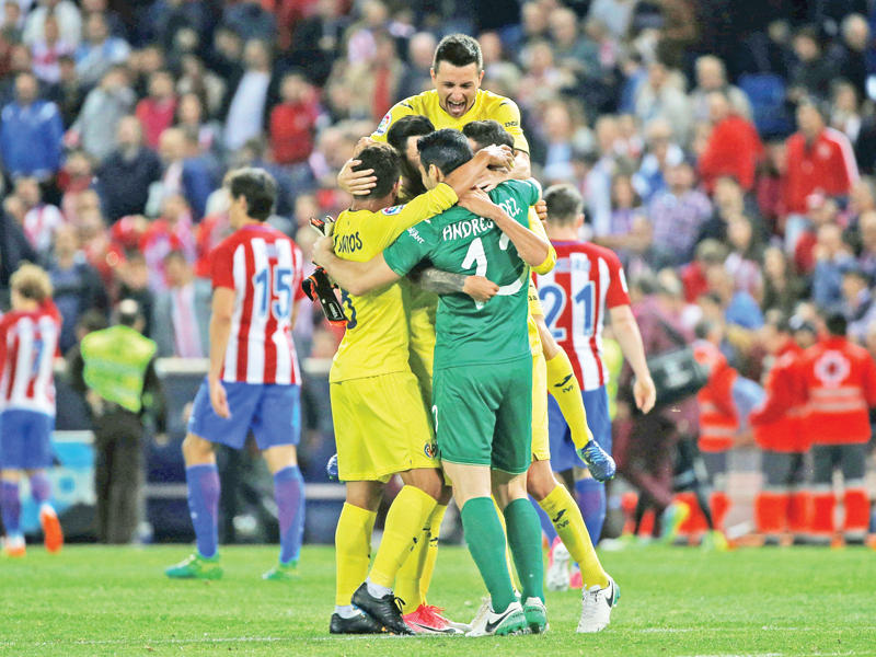 فرحة لاعبي فياريال وخيبة أمل أتلتيكو