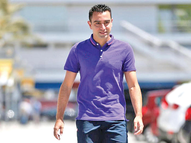  لاعب وسط برشلونة الإسباني السابق تشافي هرنانديز