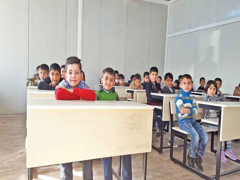 مدرسة النازحين في مخيم حسن شام بأربيل