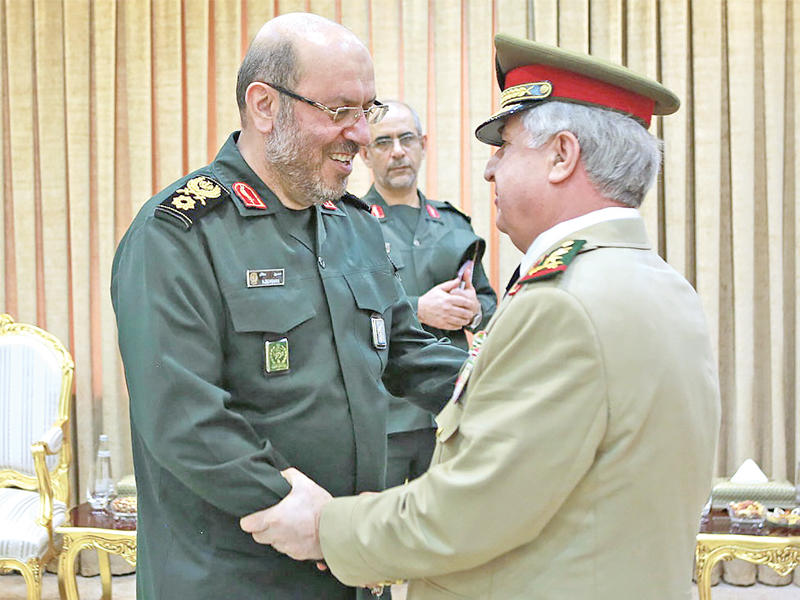  دهقان مستقبلاً أيوب في طهران أمس (أ ف ب)