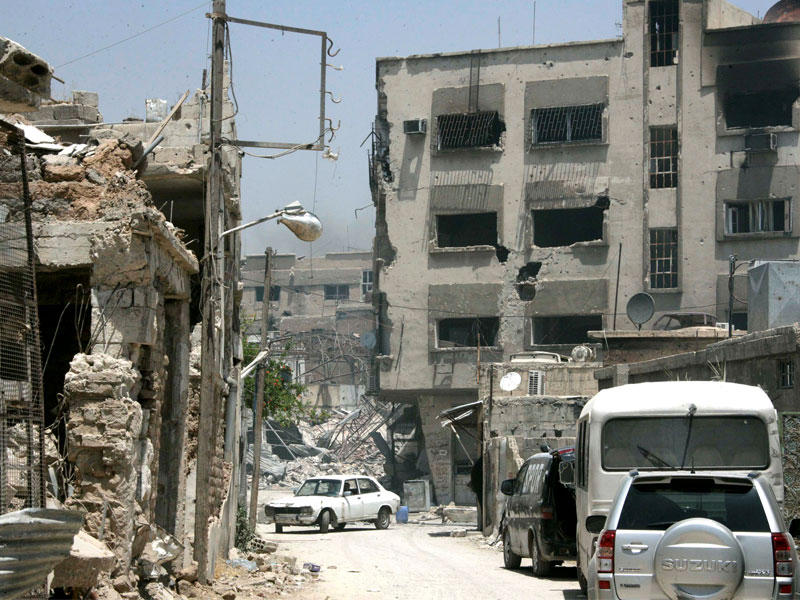 أثار الدمار في أحد شوارع حي القابون بدمشق أمس الأول (رويترز)