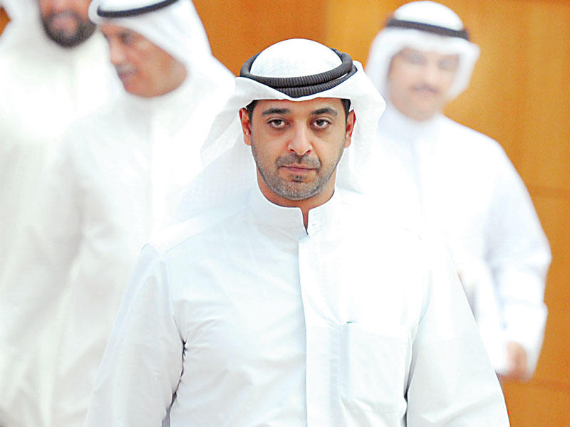 وزير الدولة لشؤون مجلس الوزراء وزير الاعلام بالوكالة الشيخ محمد العبدالله 