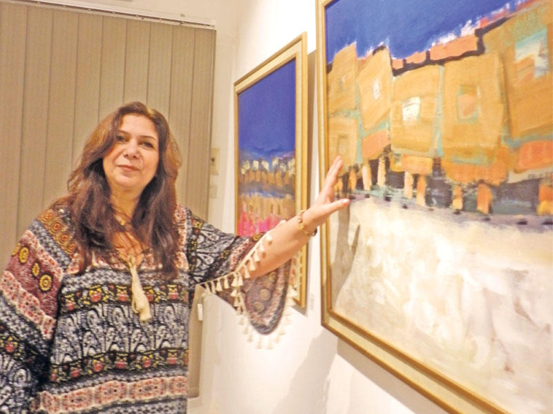 التشكيلية الفلسطينية أميرة مناحn