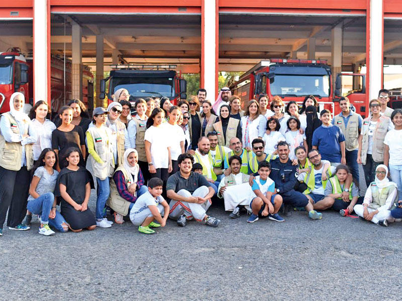 صورة جماعية لأعضاء حملة «بيتكم عامر»n