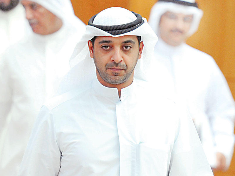 وزير الدولة لشؤون مجلس الوزراء وزير الاعلام بالوكالة الشيخ محمد العبدلله 