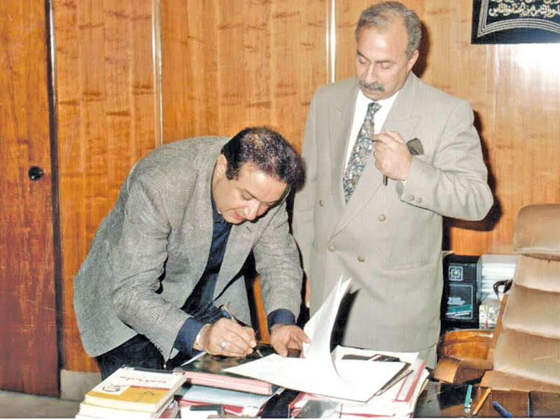 نور الشريف مع المنتج ممدوح الليثي