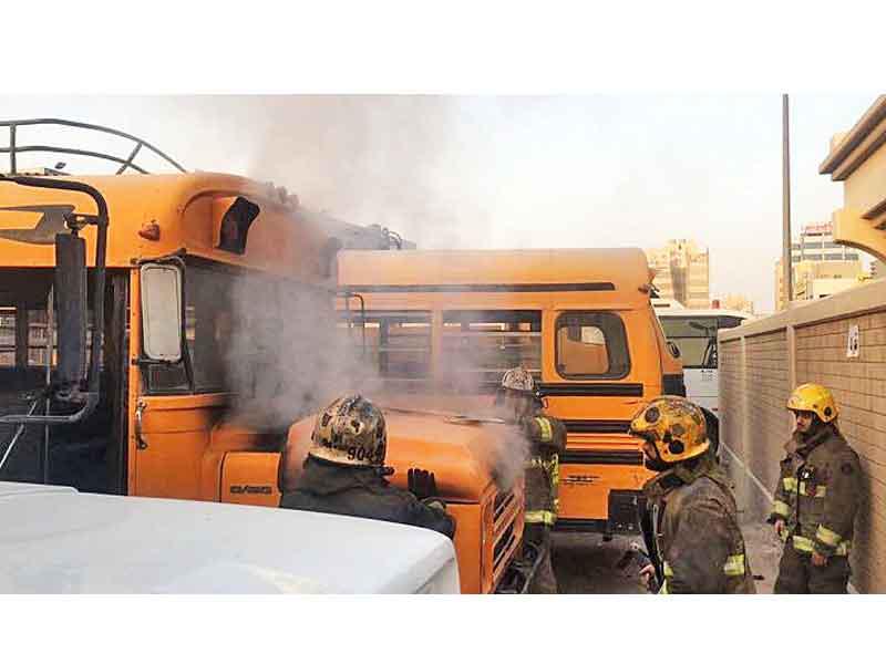 إخماد حريق الحافلات