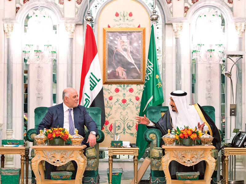 العبادي وخادم الحرمين الشريفين العاهل السعودي الملك سلمان بن عبدالعزيز