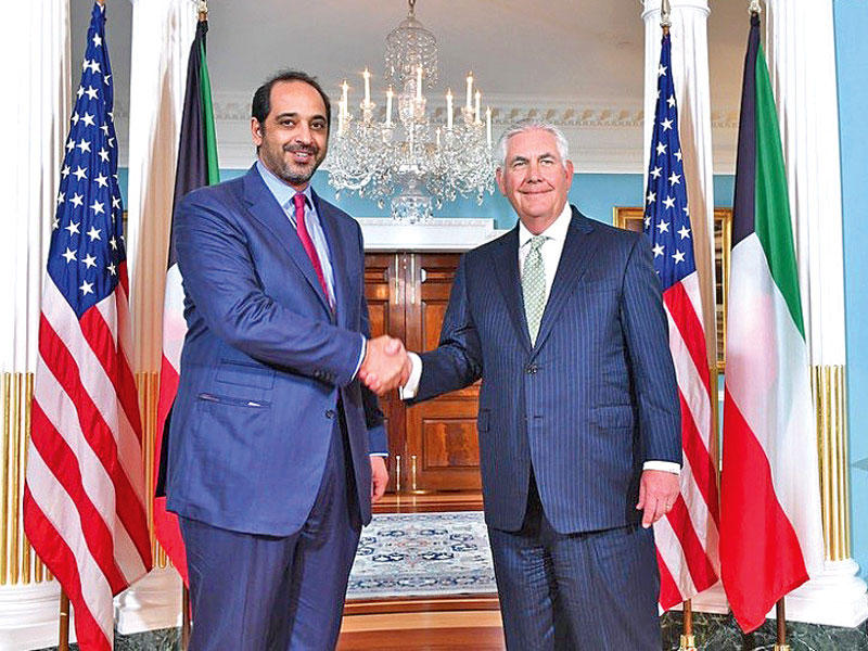محمد العبدالله وتيلرسون في مقر الخارجية الأميركية بواشنطن مساء أمس الأول t(كونا)