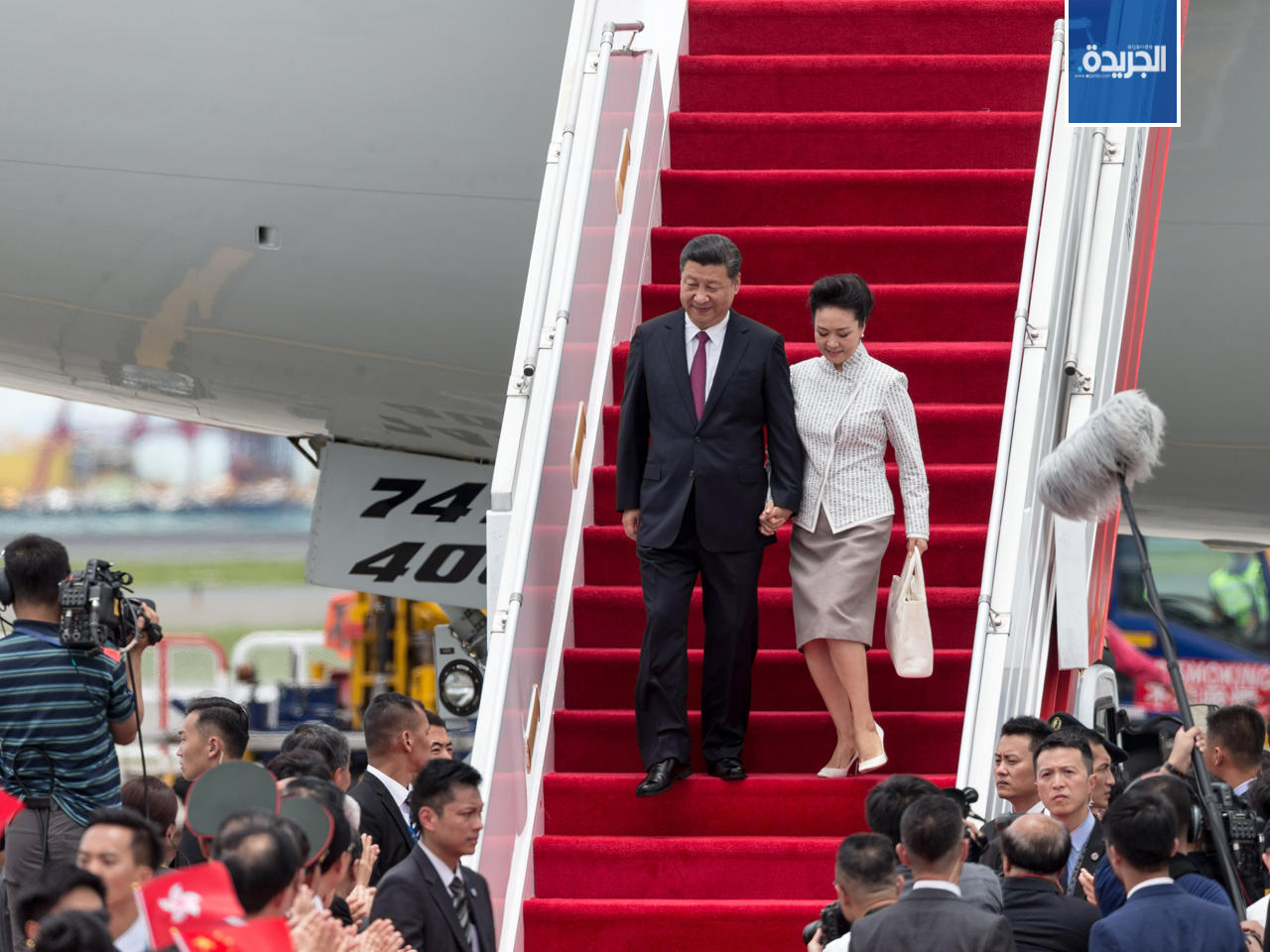 الرئيس الصيني والسيدة الأولى يصلان إلى مطار هونغ كونغ الدولي