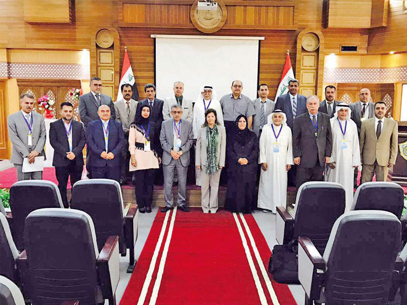 وفدا معهد الأبحاث وجامعة البصرة في لقطة تذكارية