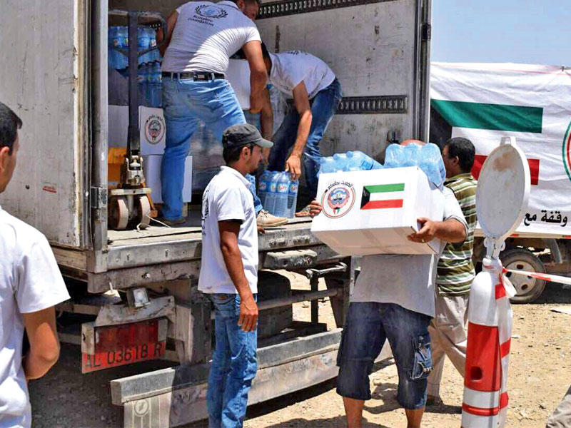 جانب من توزيع المساعدات الكويتية في الموصلn