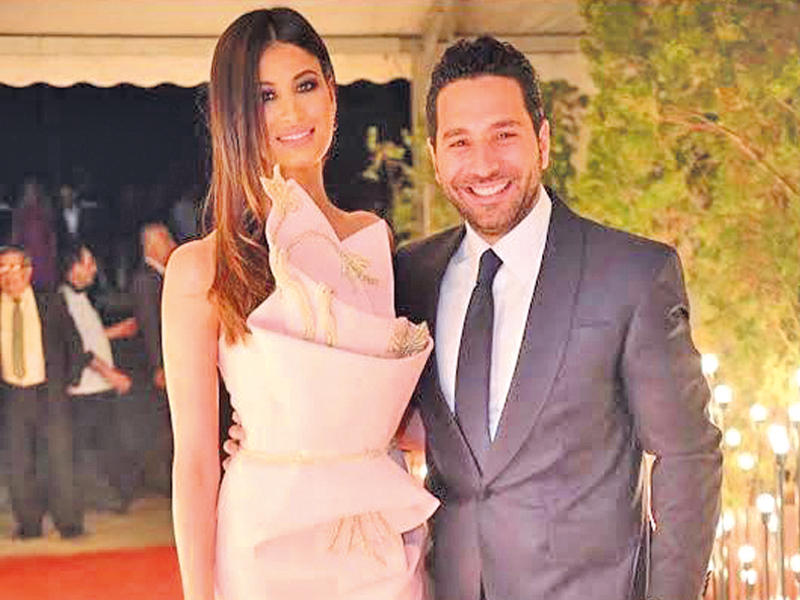 وسام بريدي وزوجته