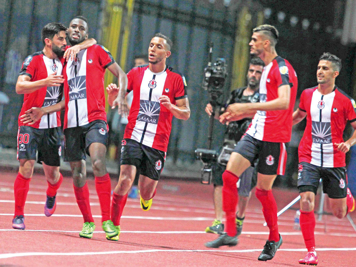 لاعبو الفتح يحتفلون بهدف التعادل