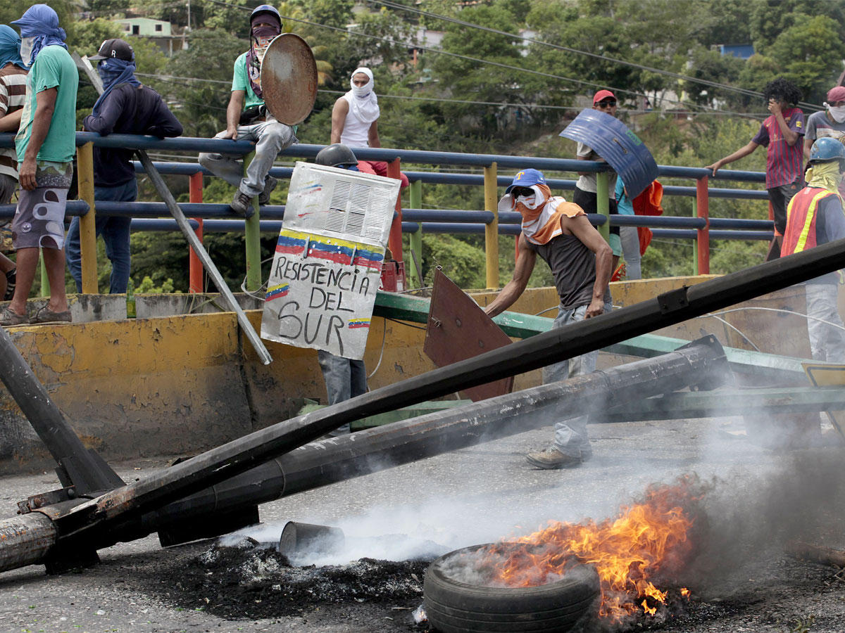 المحتجون خلال مظاهرة في باركيسيميتو، فنزويلا