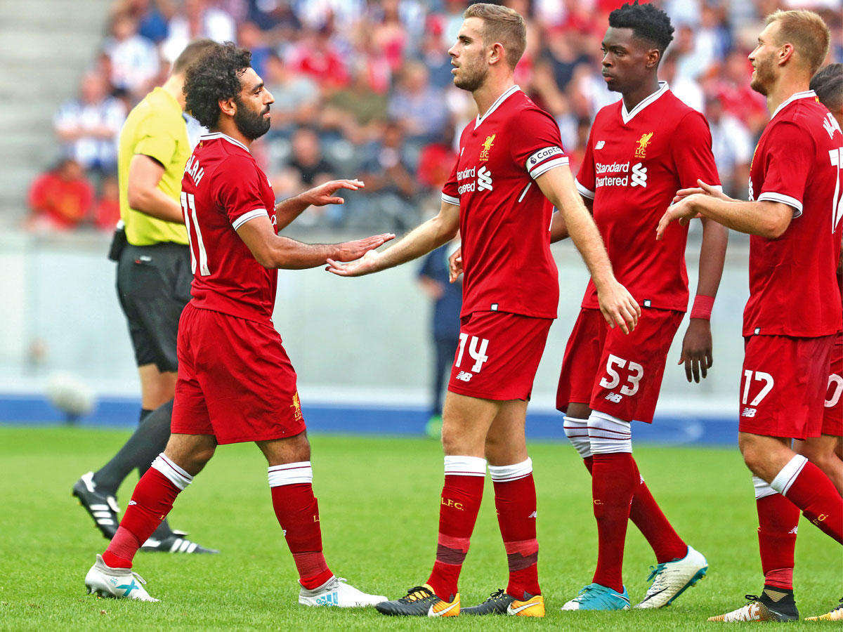 محمد صلاح نجم ليفربول يحتفل بهدفه في مرمى هرتا برلين