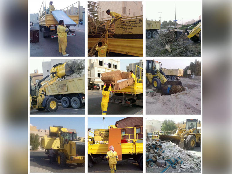 صور لعمال البلدية اثناء رفع  المخلفات