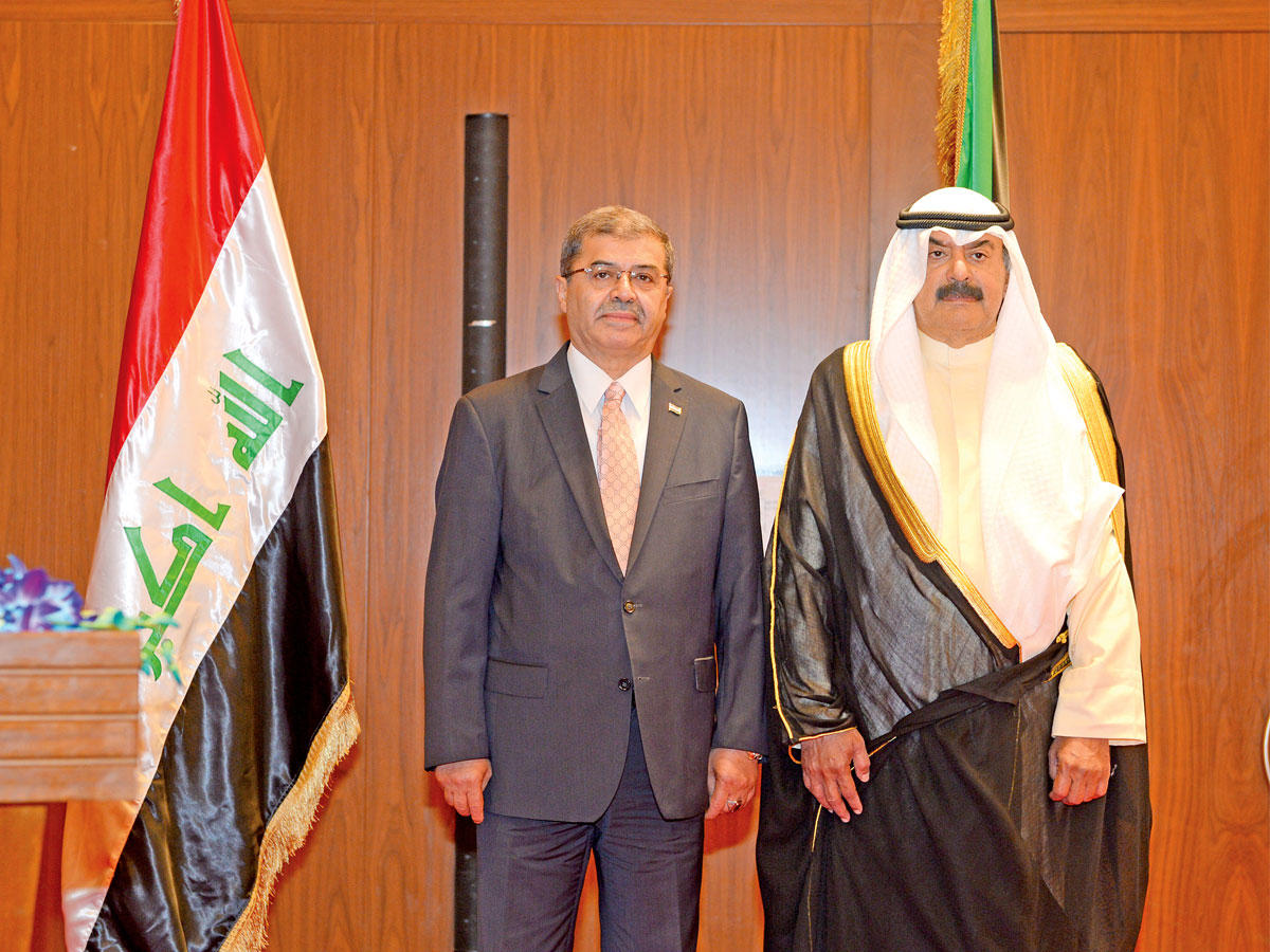 الجارالله مع السفير العراقي خلال الحفل  (تصوير نوفل إبراهيم)