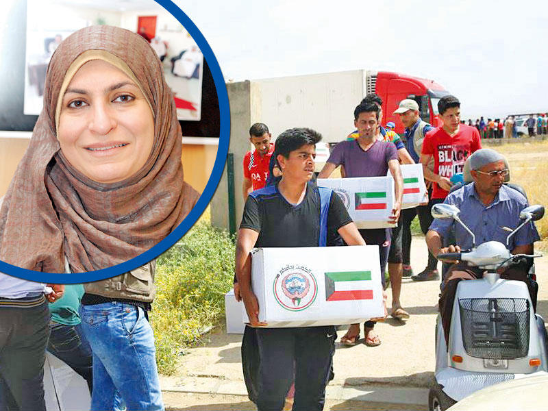  رئيسة بعثة المنظمة الدولية للهجرة في الكويت إيمان عريقات - جانب من المساعدات الكويتية للنازحين في العراق