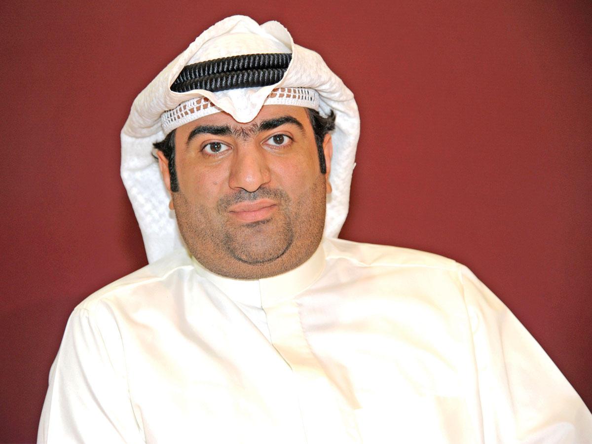 وزير التجارة والصناعة وزير الدولة لشؤون الشباب بالوكالة خالد الروضان