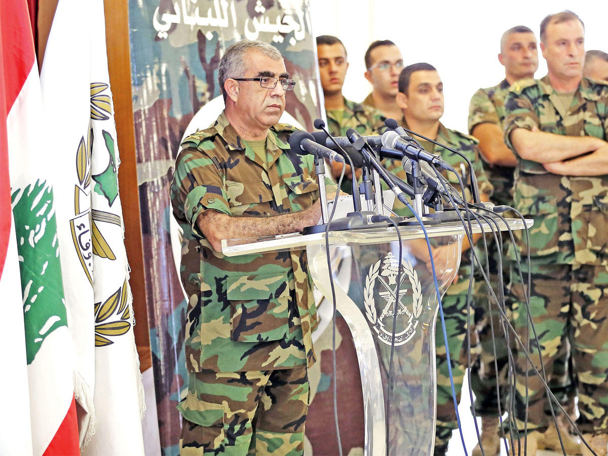 قانصوه متحدثاً في مؤتمره الصحافي باليرزة شرق بيروت أمس (أ ف ب)