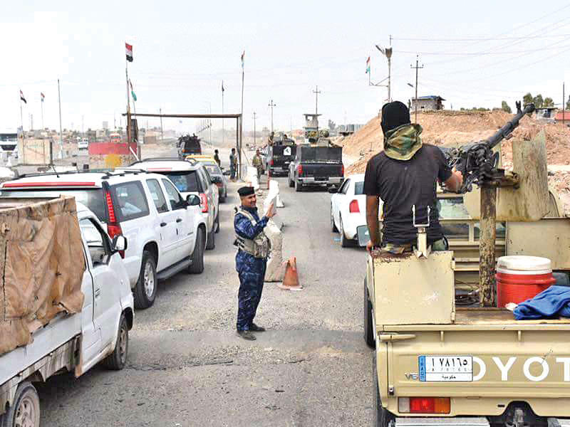 قوة مسلحة من «الحشد الشعبي» تدخل إلى كركوك أمس 