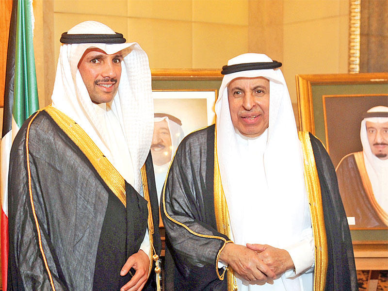 رئيس مجلس الأمة مرزوق الغانم مهنئاً السفير السعودي