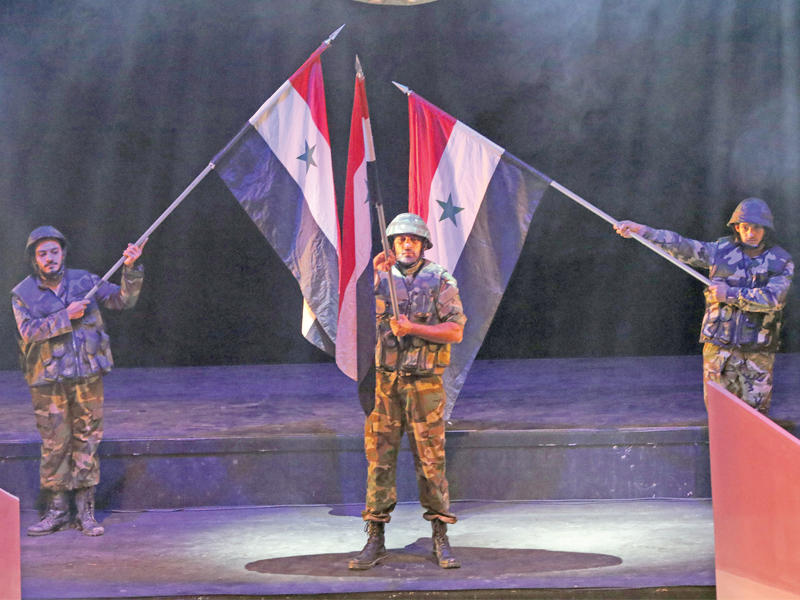 جانب من عرض داعم للجيش السوري أقيم في دمشق أمس الأول (أي بي ايه)