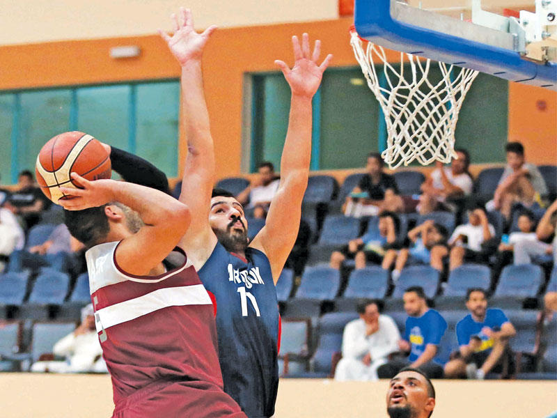 محاولة تسجيل عنابية في سلة اليرموك   (تصوير جورج رجي)