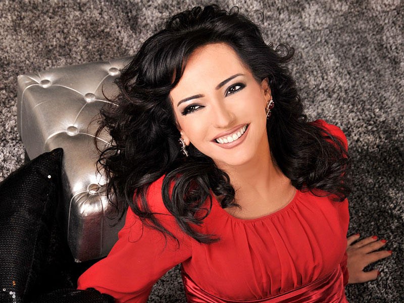 الفنانة السورية أمل عرفة