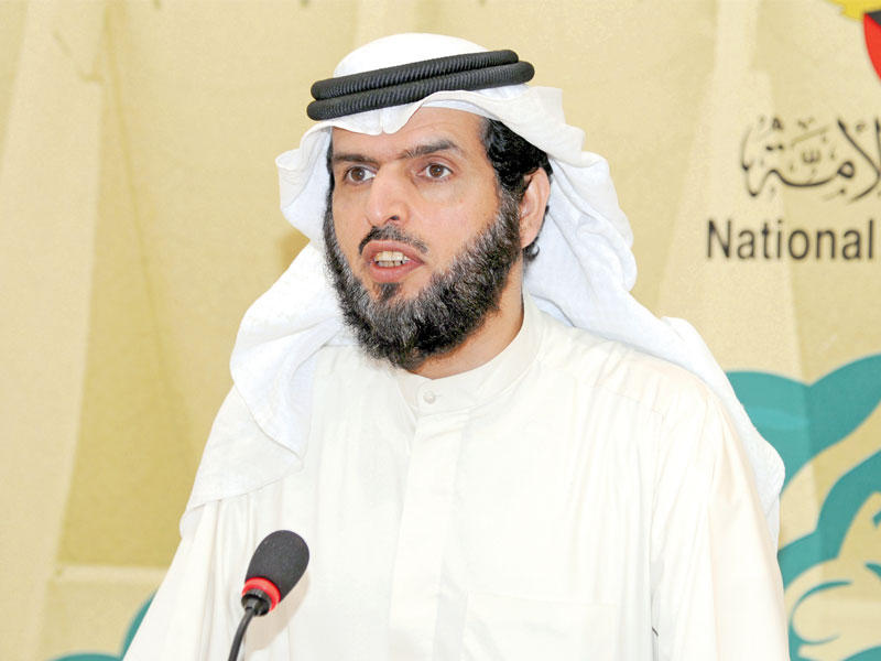 النائب عادل الدمخي