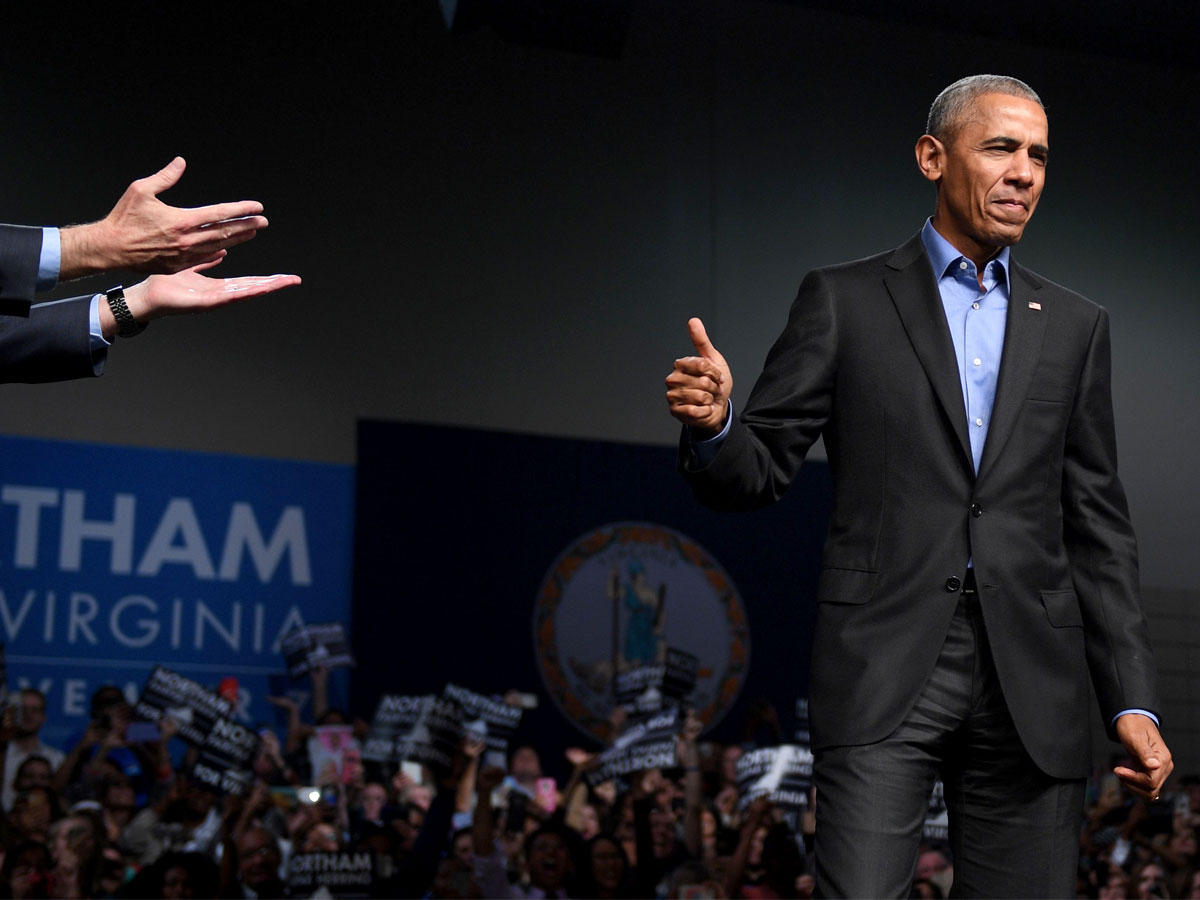 أوباما يشارك حملة دعم المرشح الديمقراطي لمنصب حاكم فيرجينيا رالف نورثام أمس (أ ف ب)