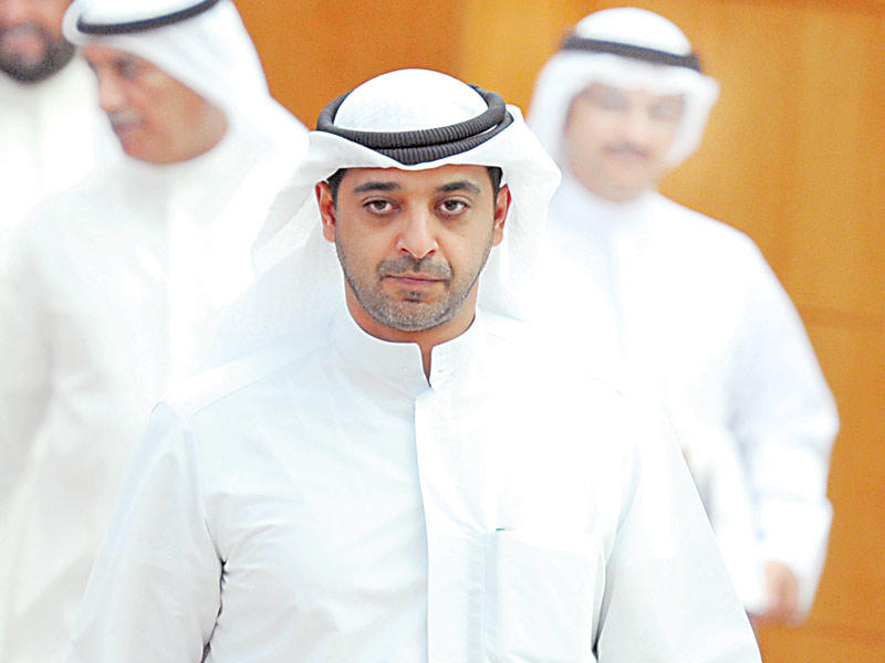 وزير الدولة لشؤون مجلس الوزراء وزير الاعلام بالوكالة الشيخ محمد العبدالله