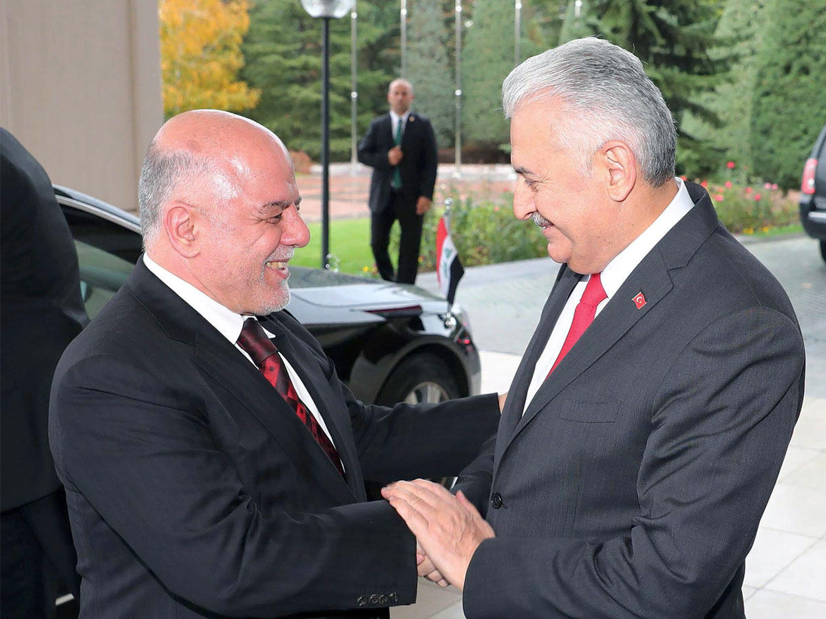 العبادي ونظيره التركي أمس (أ ف ب)