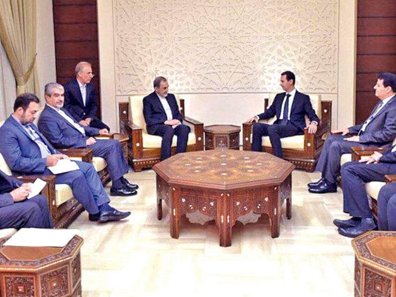 الأسد مستقبلاً ولايتي في دمشق أمس