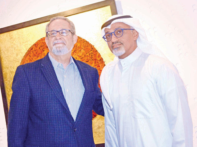 السفير الأميركي لورانس سيلفرمان وإبراهيم القصاب