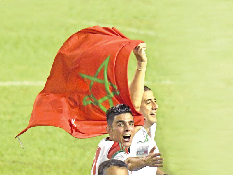 لاعبو المغرب يحتفلون   (أ ف ب)