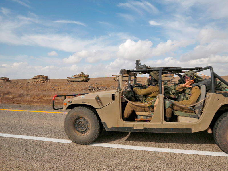 حشود عسكرية إسرائيلية في الجولان أمسt(أ ف ب)