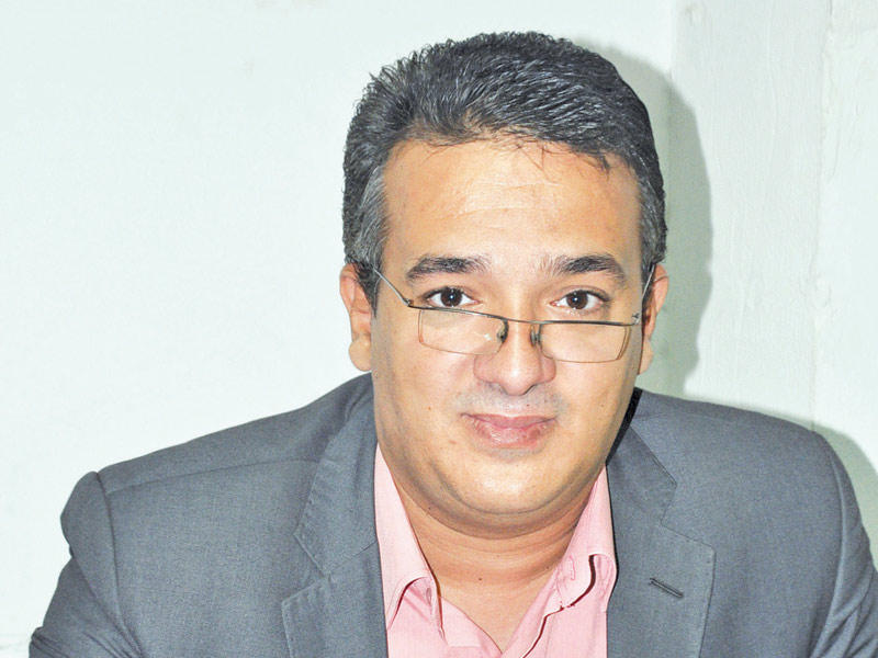 أستاذ العلوم السياسية في جامعة القاهرة، باسم رزق