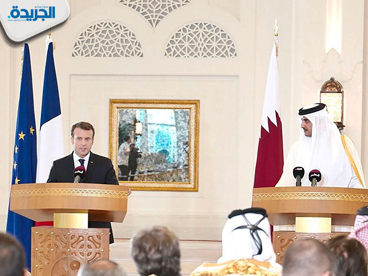 الرئيس الفرنسي ايمانويل ماكرون في مؤتمر صحفي مشترك مع امير دولة قطر الشيخ تميم بن حمد 
