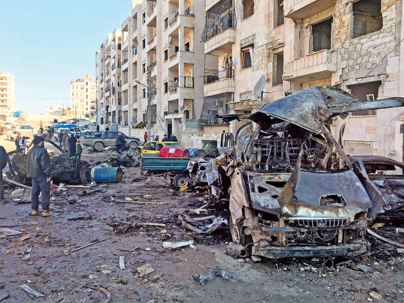 مركز أجناد القوقاز في إدلب بعد استهدافه أمس    (أ ف ب)