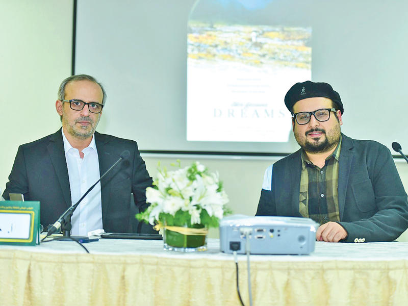 خلف العصيمي وخلف العنزي أثناء الندوة