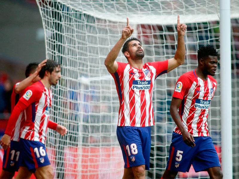 لاعبو أتلتيكو مدريد خلال مباراة سابقة في الدوري الإسباني