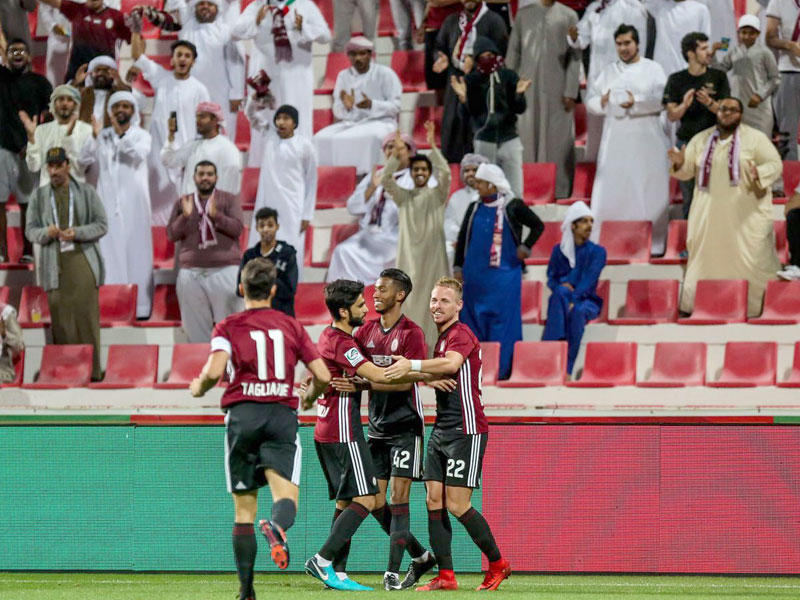 لاعبو الوحدة الإماراتي يحتفلون بالفوزn