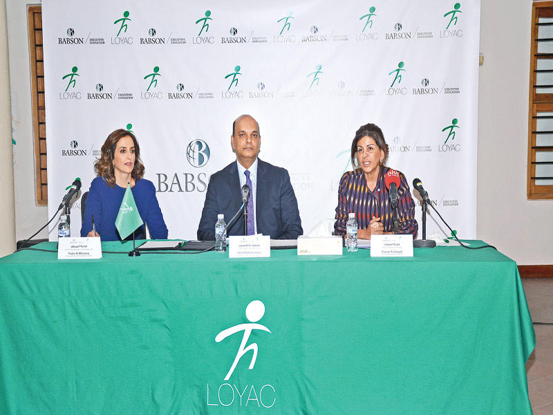 السقاف والمرزوق وراداكيسون خلال توقيع الاتفاقية (تصوير ميلاد غالي)