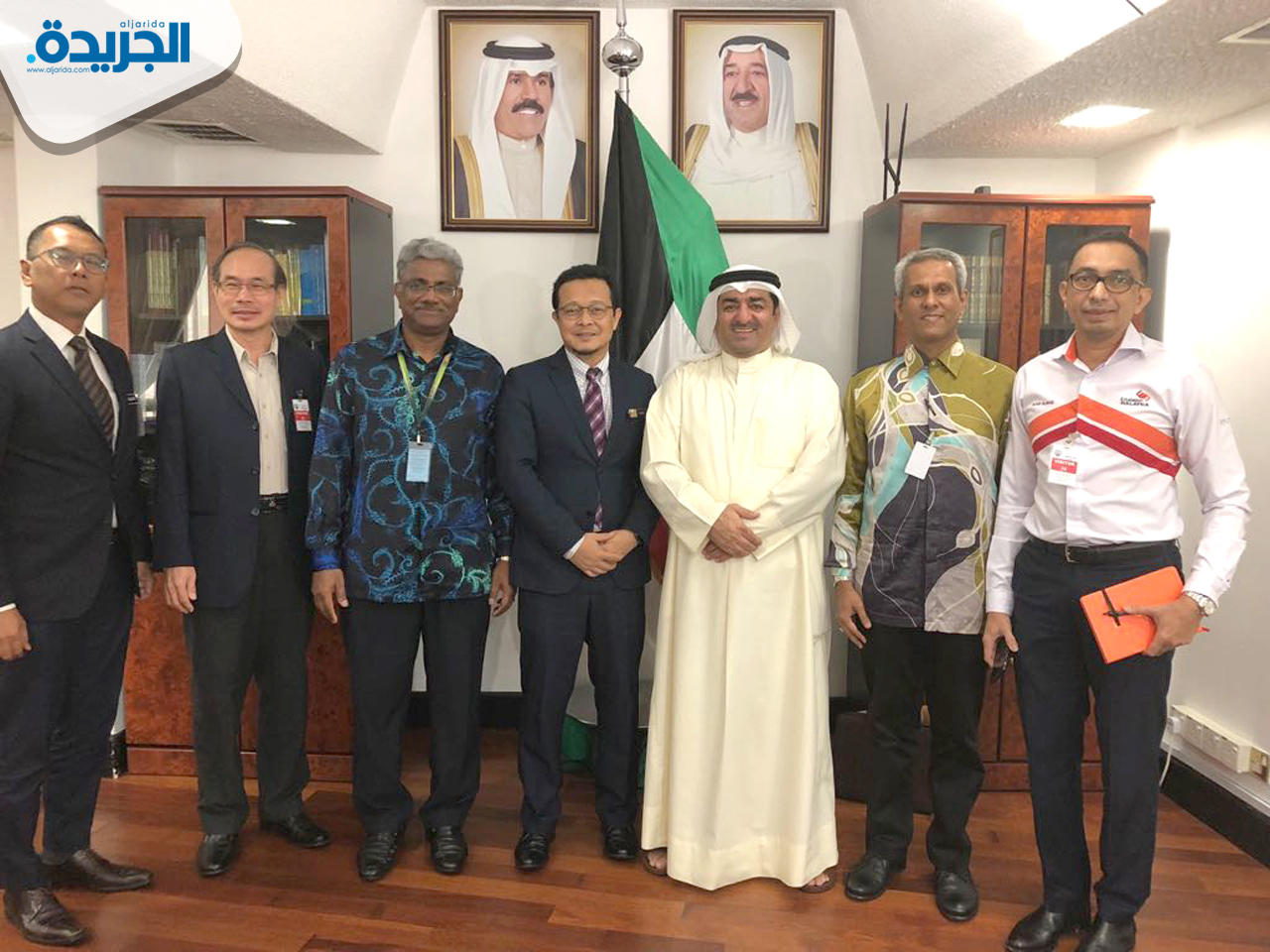 صورة جماعية لأعضاء الوفد الماليزي