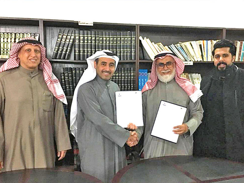 الجارالله الخرافي والرميضي يتبادلان اتفاقية التعاون