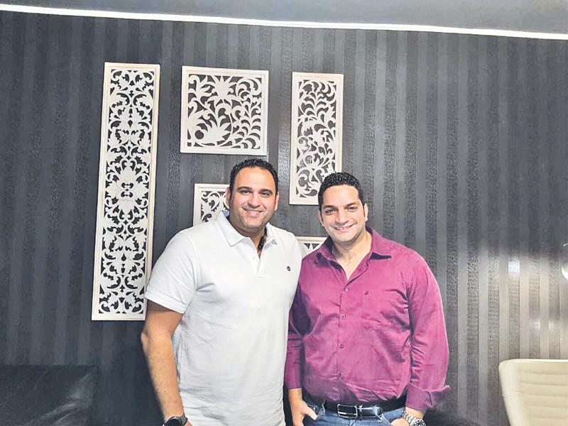 كريم أبو ذكري مع اكرم حسنيn